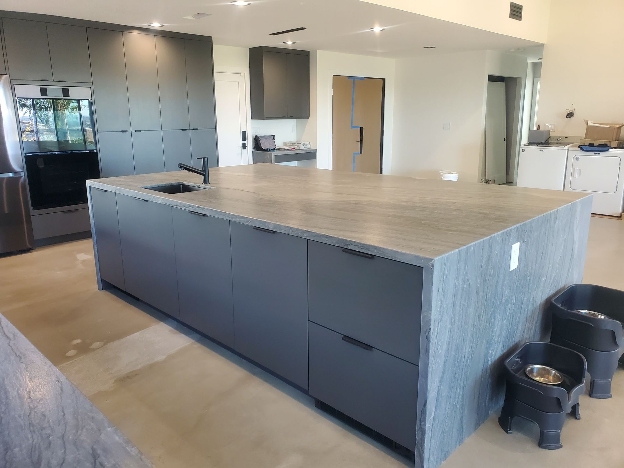 Refinished white shaker kitchen cabinets in San Diego — professionally sprayed with conversion varnish