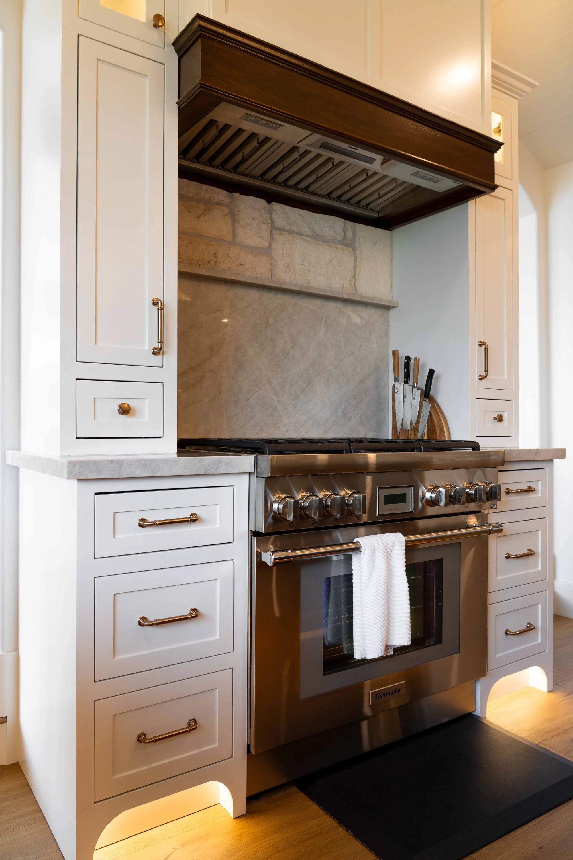 La Jolla Kitchen Renovation - Open-concept kitchen with integrated appliances and floor-to-ceiling cabinetry in La Jolla