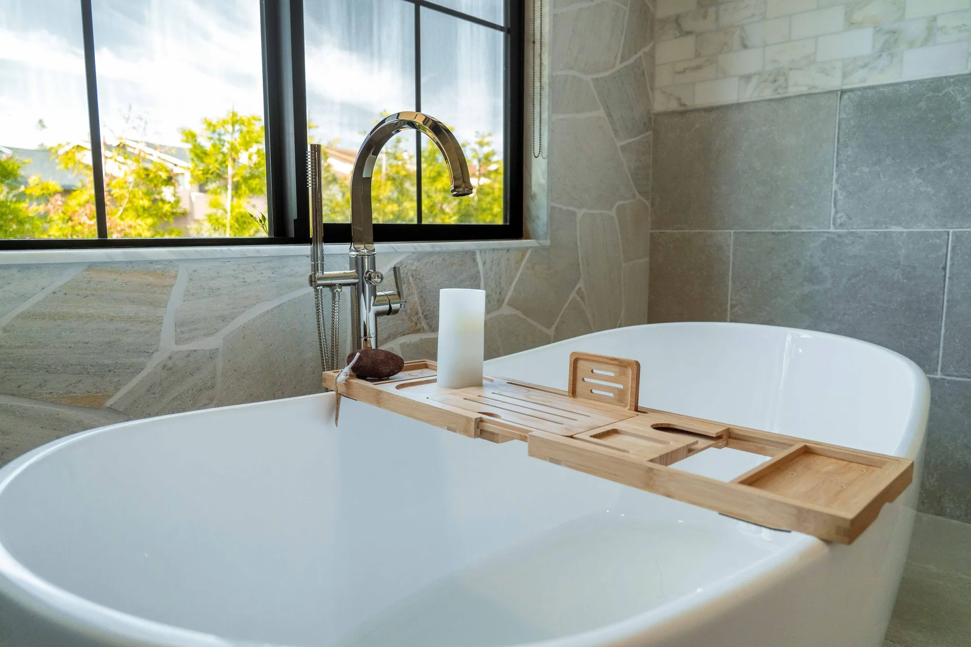 Custom bathroom renovation in La Jolla with walk-in shower, custom vanity, frameless glass door, and large-format tile by SD Remodel Experts