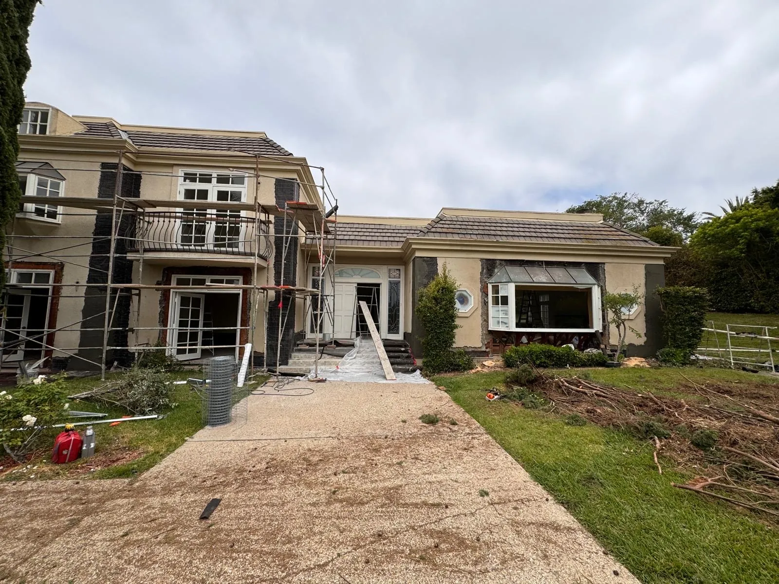 Exterior wall preparation and site protection before structural framing work
